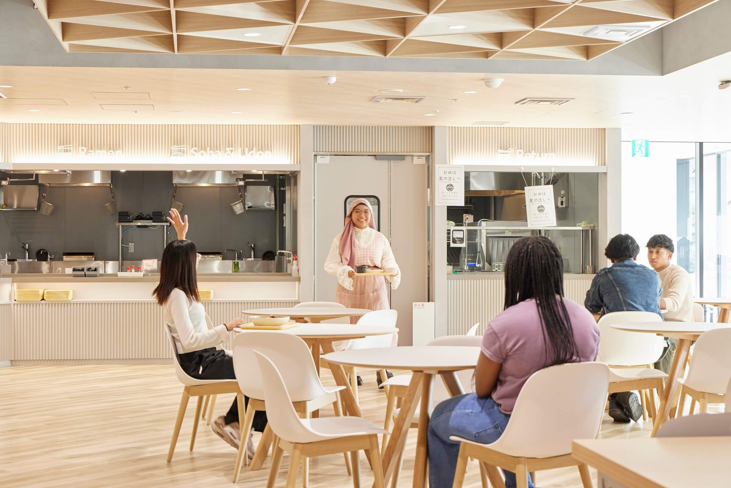 Students getting food at the Good Health cafeteria